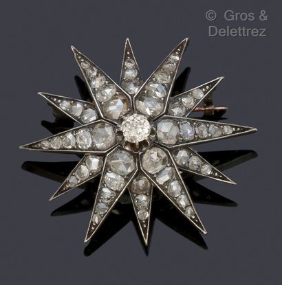 null Yellow gold and silver "Star" brooch, set with rose-cut diamonds. Diameter :...