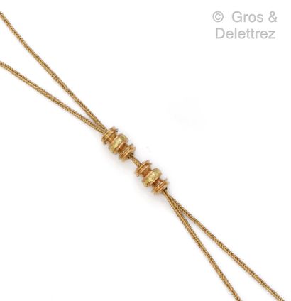  Yellow gold necklace made of two chains with column link, decorated with pink gold...