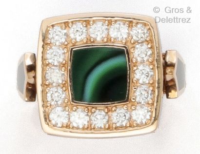 null Black enamelled pink gold ring, set with a square malachite plaque in a brilliant-cut...