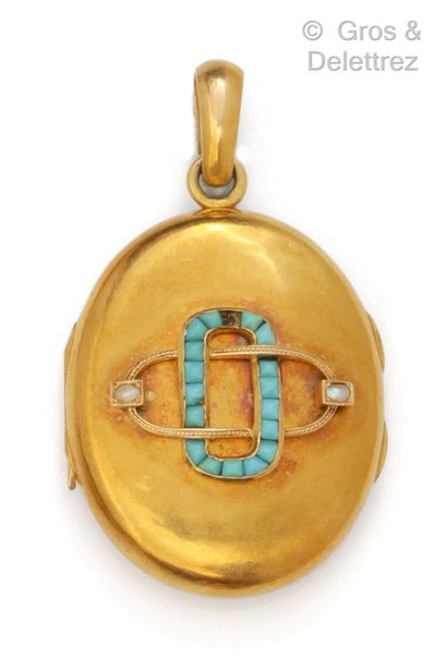 Yellow gold pendant "Porte-souvenir", decorated with interlaced oblong motifs set...