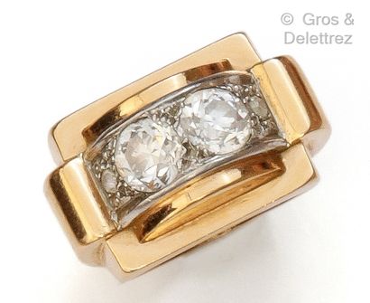 null Yellow gold and platinum "Tank" ring, featuring a bridge set with two old-cut...