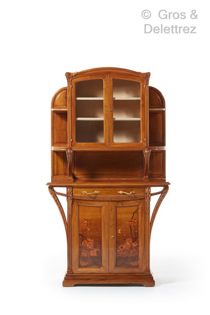 Louis MAJORELLE (1859-1926) Walnut "Chicory" storage unit with two doors decorated...