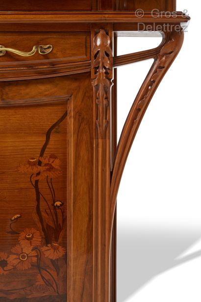 Louis MAJORELLE (1859-1926) Walnut "Chicory" storage unit with two doors decorated...