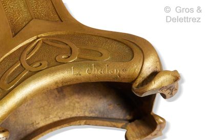 Louis CHALON (1866-1940) Rare pendulette en bronze à patine dorée à décor finement...