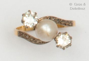 null Yellow gold "Toi et Moi" ring, set with a button pearl and two brilliant-cut...