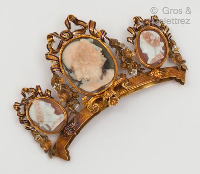 null 
Gold tiara center of several shades enamelled, decorated with three cameos...