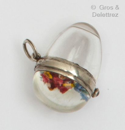  Silver and crystal "Egg" pendant with a sulphur flower motif. Gross weight: 10....