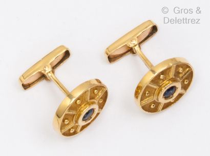 LALAOUNIS Pair of yellow gold cufflinks, each with a sapphire. Gross weight: 10.4g....