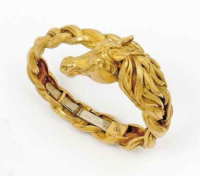 HERMÈS Bracelet «Tête de cheval» en or jaune. Signé Hermès Paris. Poids: 130g.