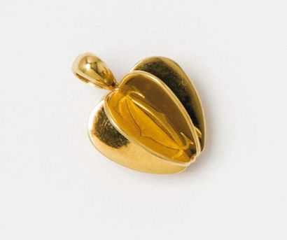 CARTIER Pendentif «Coeur» en or jaune gravé de «C» entrelacés. Signé Cartier. Poids:...