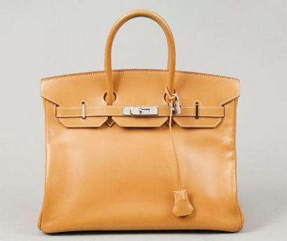 HERMES Paris made in France Sac « Birkin « 35 cm en veau barénia gold, attaches et...