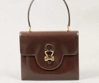 HERMES Paris Sac «Clovis» à deux soufflets en cuir chocolat, attaches fermoir sur...