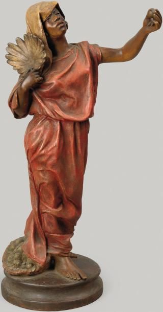 O. CACHI (XXème siècle) Femme à l'éventail Epreuve en terre cuite polychrome, signée...