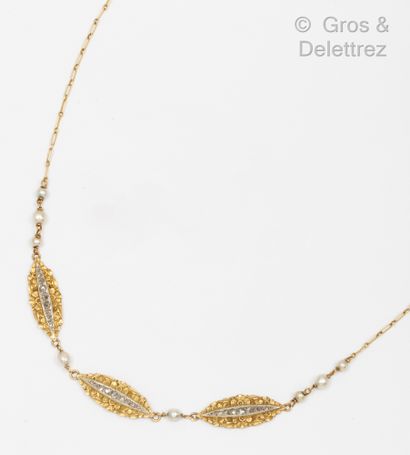 null Collar necklace in yellow and white gold, composed of oval plates with flower...