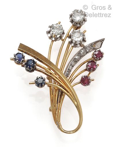 null Yellow gold "Gerbe" brooch, decorated with gold ribbons set with old-cut diamonds,...