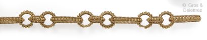 null Flexible bracelet in yellow gold decorated with twists and pearls alternating...