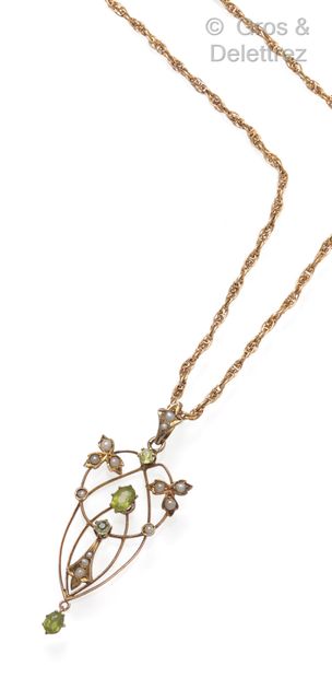 null Yellow gold (9K) pendant with interlaced ogives set with peridots and half pearls....