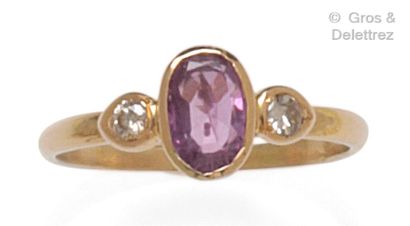Yellow gold ring set with an oval tourmaline...