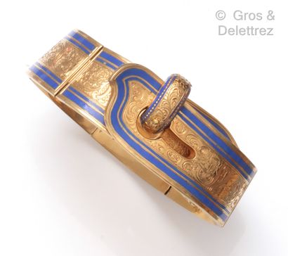 null Yellow gold "Belt" bracelet, finely chased with foliage scrolls, underlined...