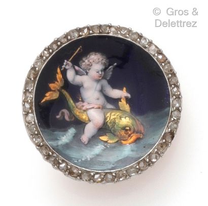 null A yellow gold circular pendant with an enamelled plate showing a cherub on a...