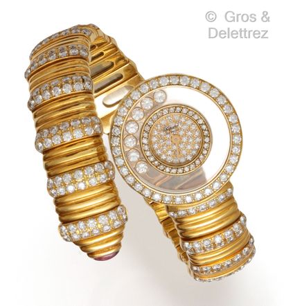 CHOPARD « Happy Diamonds » – Rare montre de dame en or jaune, boîtier rond, lunette...