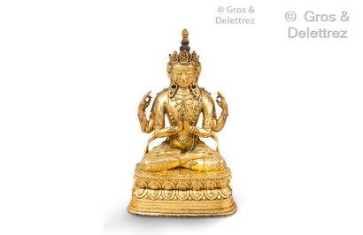 null Chine, Statuette en bronze doré, représentant un boddhisattva à quatre bras,...