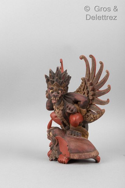 null Indonesia, 20th century

Wooden subject representing Garuda on a turtle. 

H....