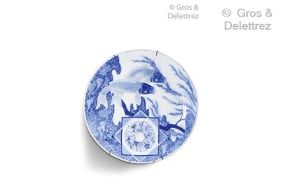 null Large blue and white porcelain dish decorated with two carps among waves and...