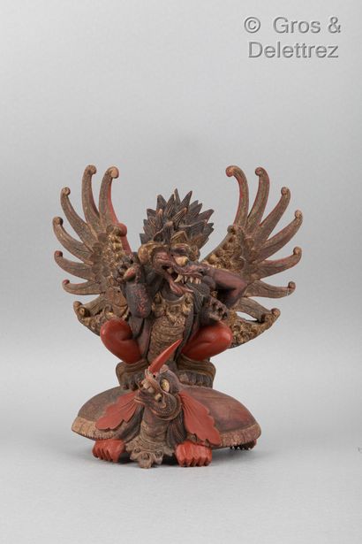 null Indonesia, 20th century

Wooden subject representing Garuda on a turtle. 

H....