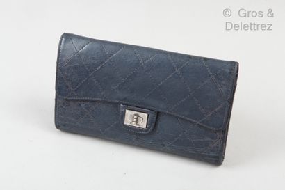 CHANEL Aged lambskin leather wallet, navy quilted, snap closure on flap, inside card...