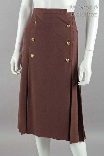 CHANEL Lot composed of two wool crepe skirts, one brown pleated, double buttoned,...