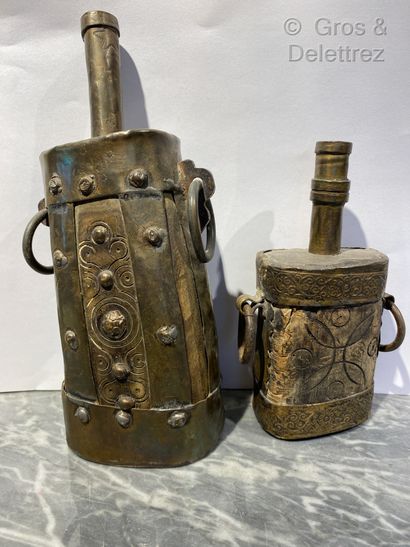 null Two bone, horn and brass powder flasks with engraved and riveted decoration.

Work...