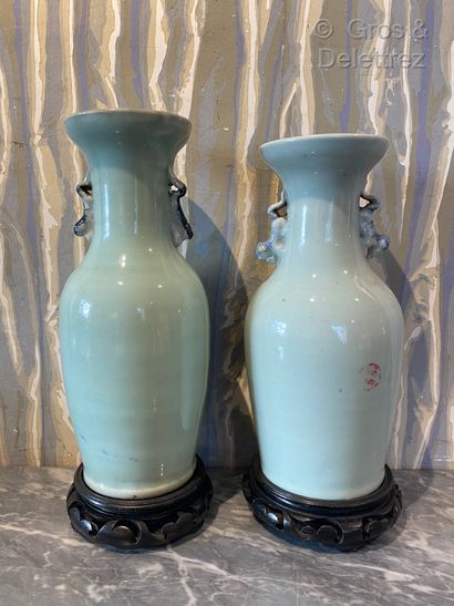 null China. Two celMobilieron enamelled porcelain baluster vases decorated in blue...