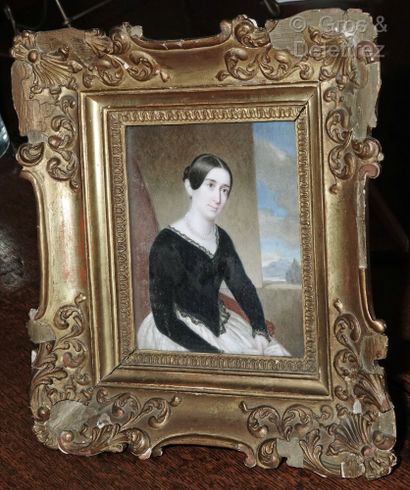 null French school, circa 1850

Portrait of a woman seated in a wood and gilded stucco...