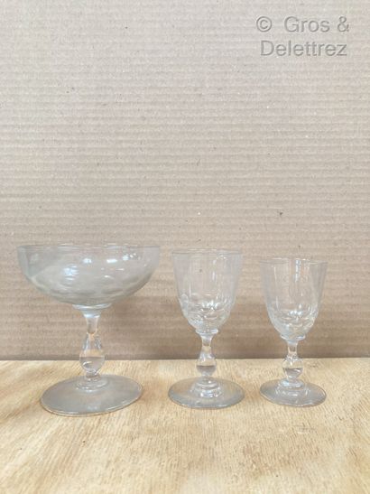 null Part of a service in engraved crystal composed of 11 champagne glasses, 15 water...