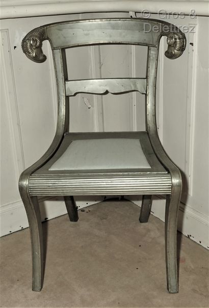 null Pair of silver plated wood chairs, the back decorated with two rams' heads,...