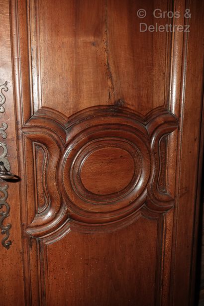 null Walnut cabinet with two doors.

Stamped by Pierre Claude TURCOT, received Master...