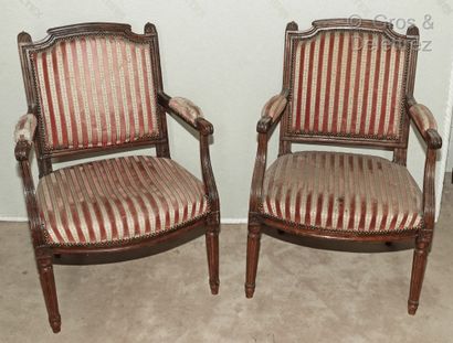 null Pair of armchairs in moulded and carved natural wood, the flat backs in the...