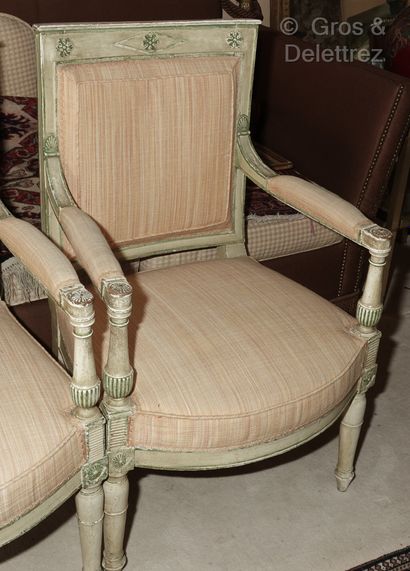 null A pair of cream and green reupholstered wood armchairs with slightly curved...