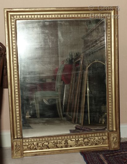 null Small rectangular wood and gilded stucco overmantel mirror decorated with foliated...
