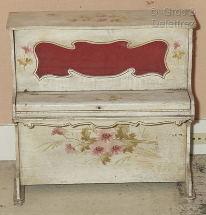 Piano jouet en bois laqué à décor floral....
