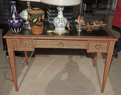 null Mahogany veneered lady's flat desk with three drawers and sheath legs.

Black...