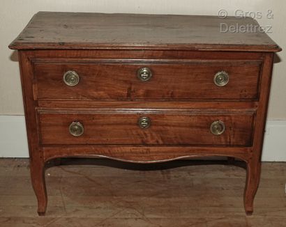 null Walnut chest of drawers, opening with two drawers, the legs arched. 

Regional...