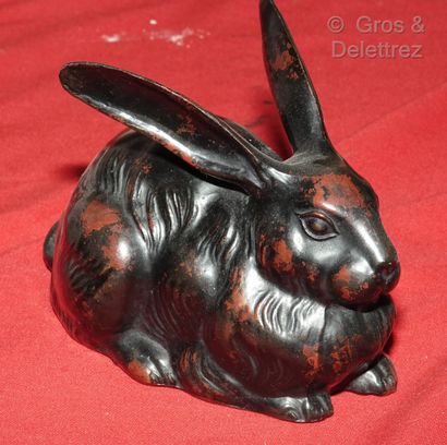 null JAPON

Deux okimono représentant des lapins en métal laqué rouge et noir à l'imitation...