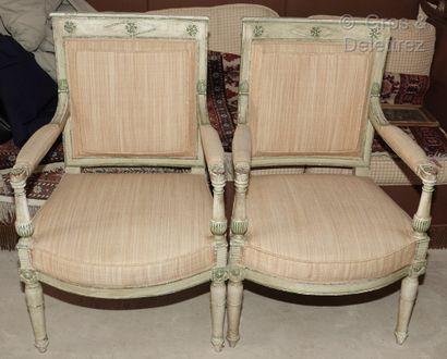 null A pair of cream and green reupholstered wood armchairs with slightly curved...