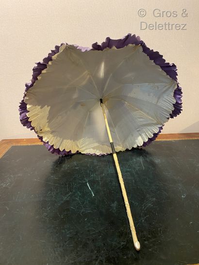 null Umbrella with ivory handle carved with foliage and flowers, trimmed with purple...