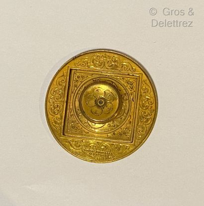 null Gilded brass seal of round shape of posts and leafy volutes with removable dies.

Patent...