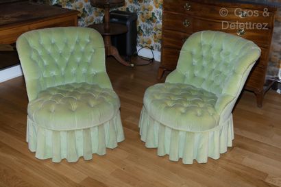 null Pair of upholstered armchairs with almond green velvet upholstery.

Provenance...