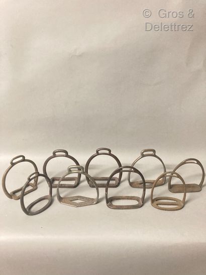 null Set of nine stirrups and two bits

19th century 

Average condition