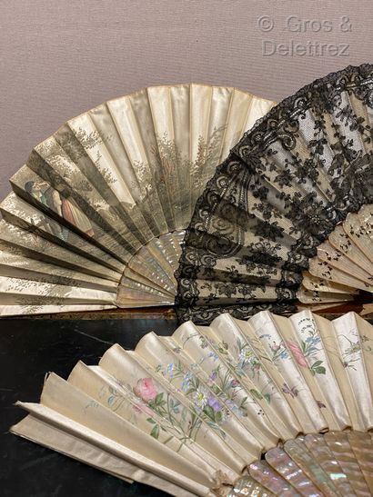 null Set of three mother-of-pearl fans with painted decoration of plants, characters...